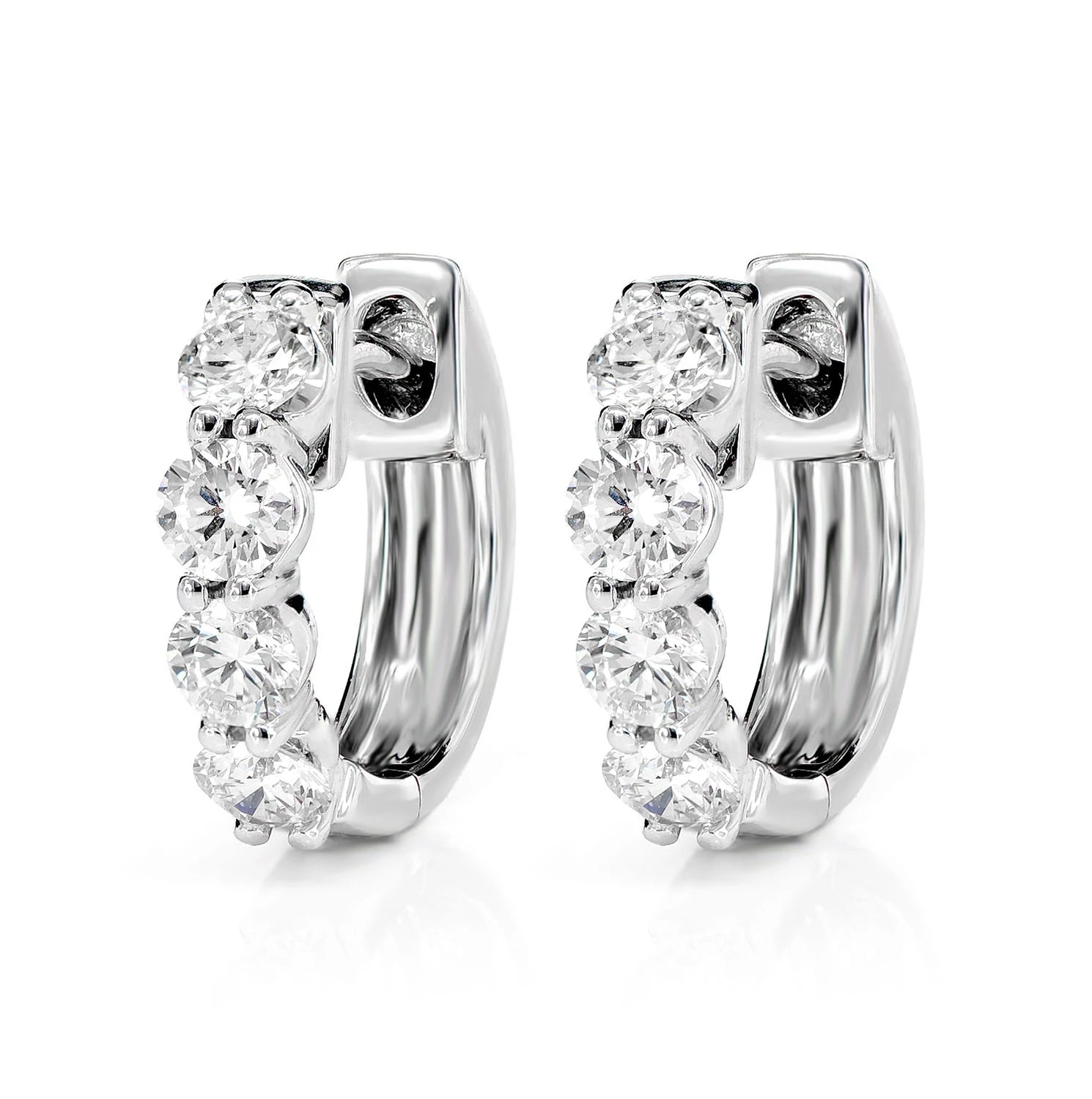 Diamond Shared Prong Huggie Earrings - in white gold