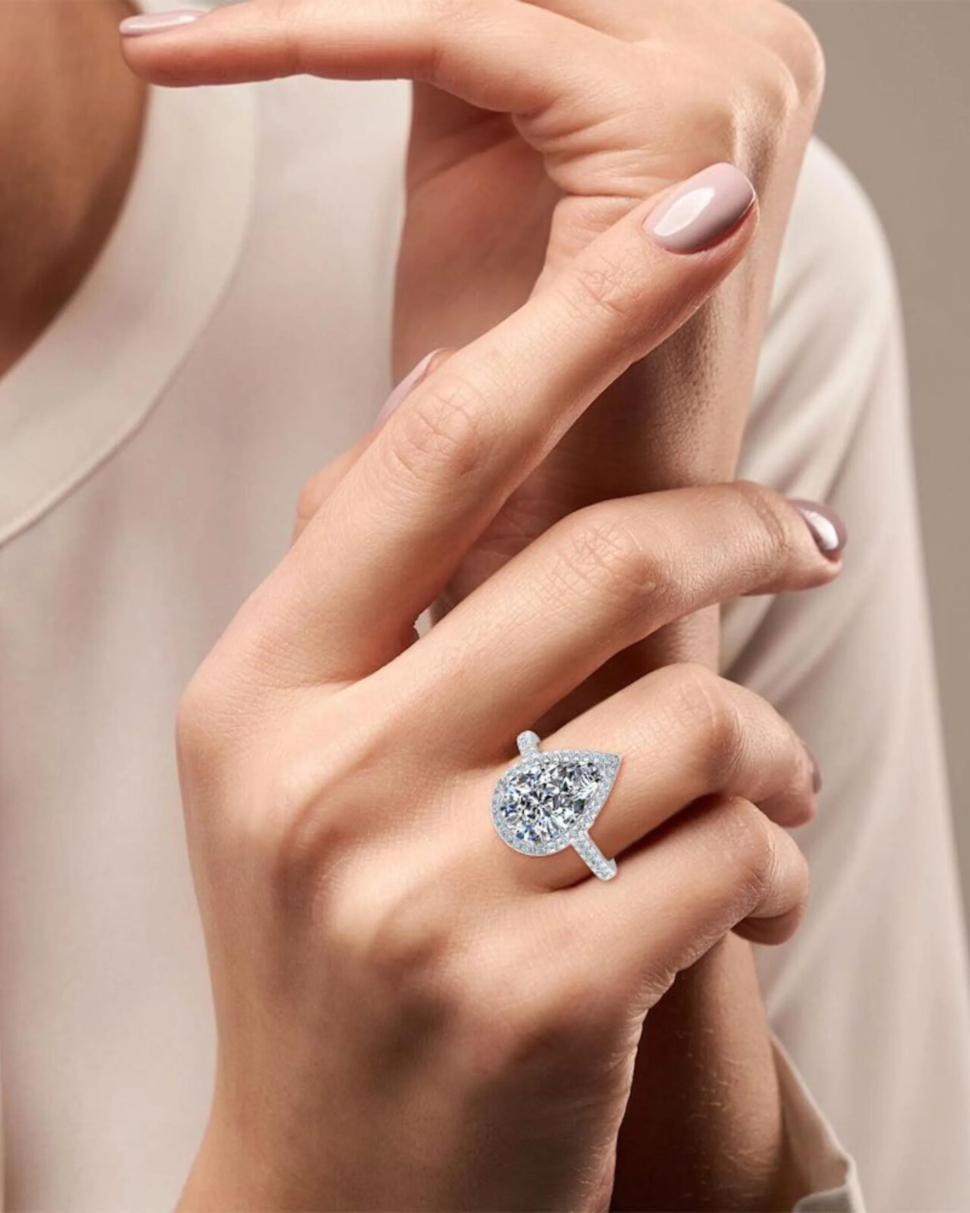 Pear Cut Moissanite Petite Halo Engagement Ring - in 14k gold (view 7 of 8)